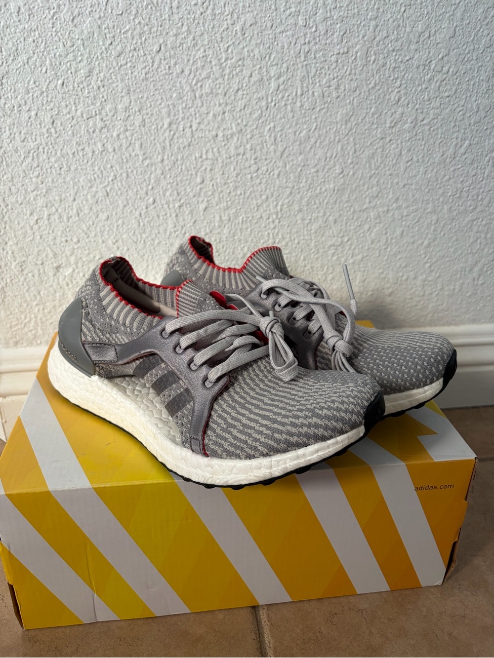adidas Grey Knit Athletic Shoes with Red Accent